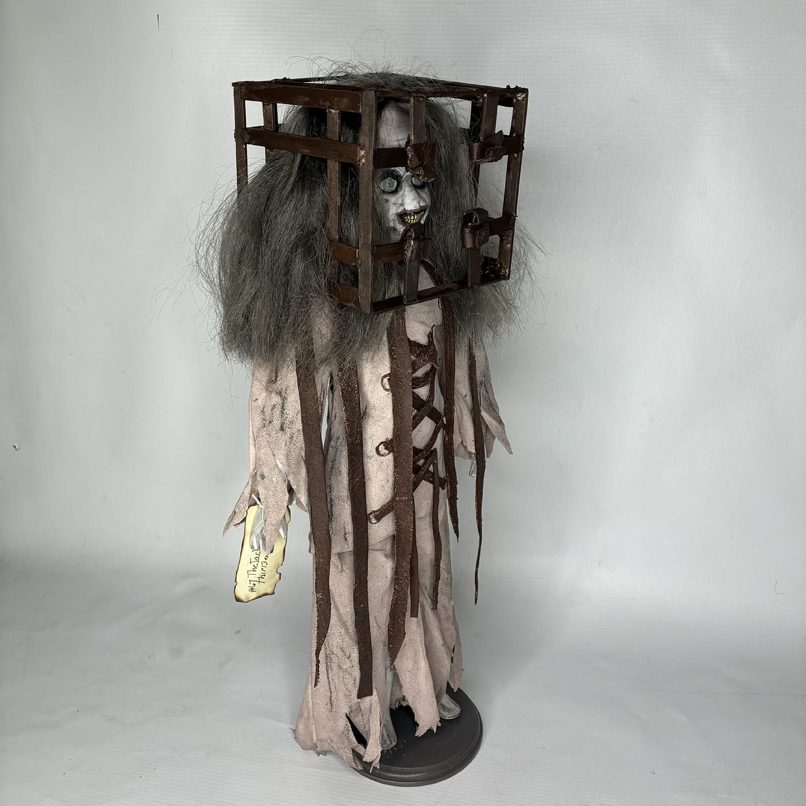 Unique distressed creepy doll for sale by Erika’s Emporium with unhinged look