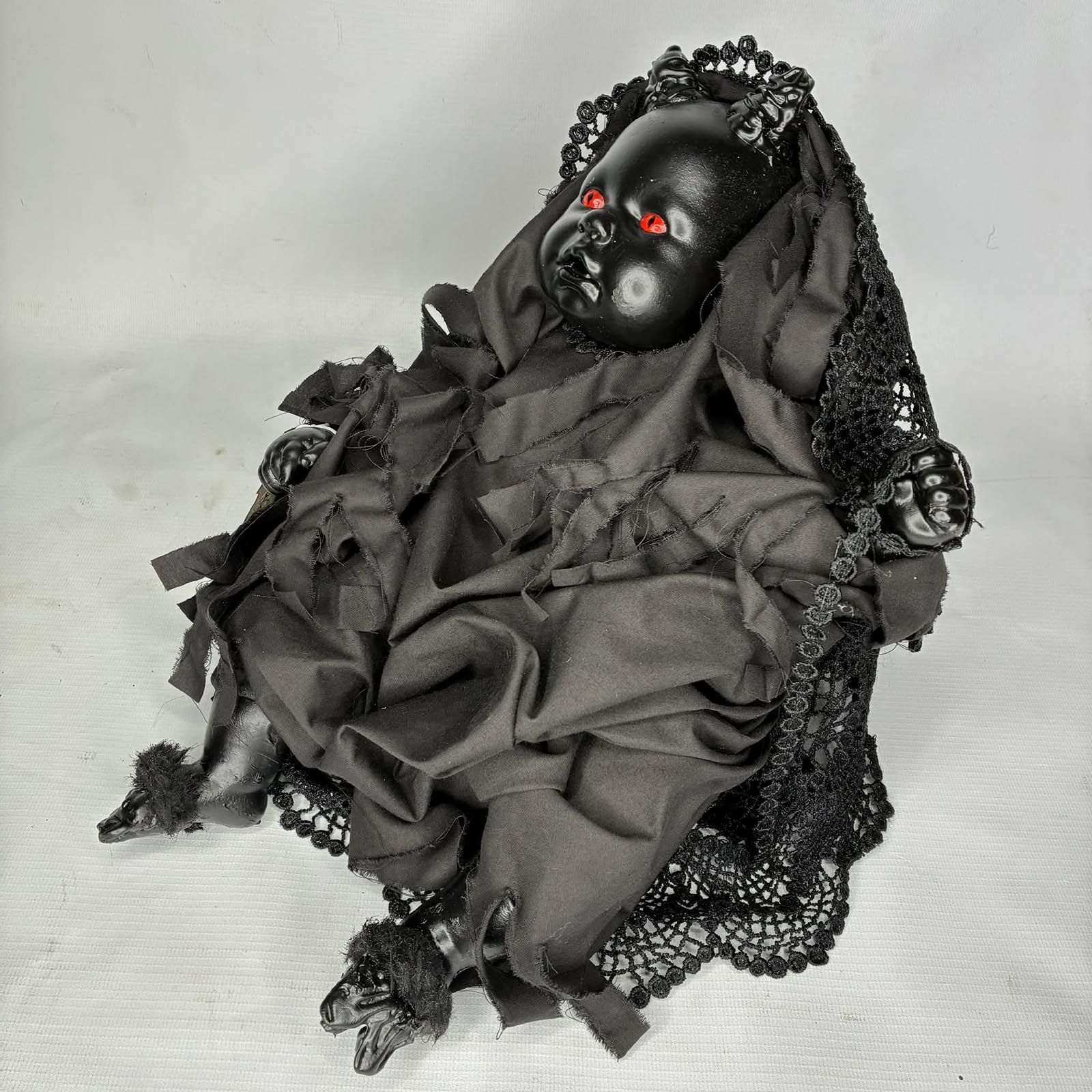 Swaddled Rosemary’s Baby creepy doll for sale Erika’s Emporium