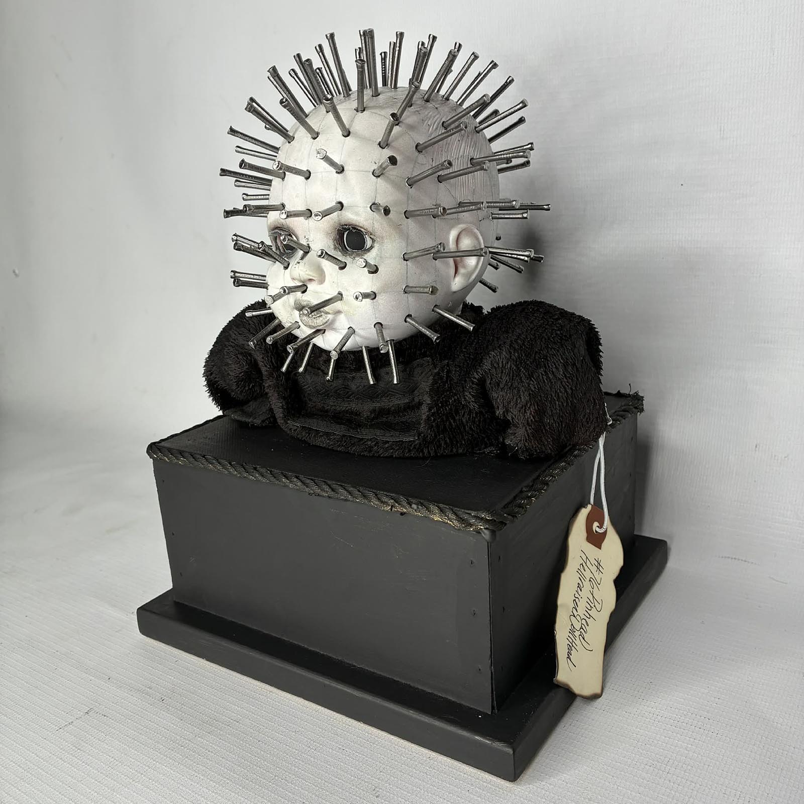 Pinhead Hellraiser horror themed doll head art piece